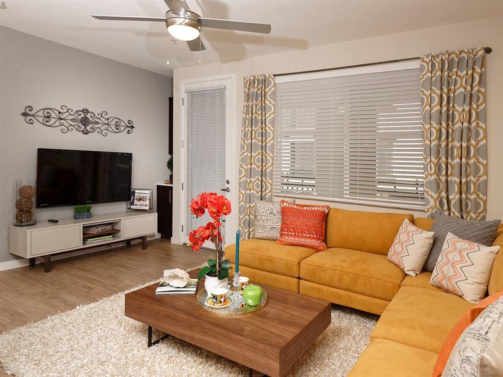 a living room with a couch and a coffee table
